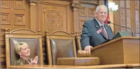  ?? Jill nolin/Georgia recorder/Townnews.com Content exchange ?? House Speaker David Ralston celebrates the passage of his sweeping mental health bill. He has credited his wife, seated, with challengin­g him to take on the mental health reforms.