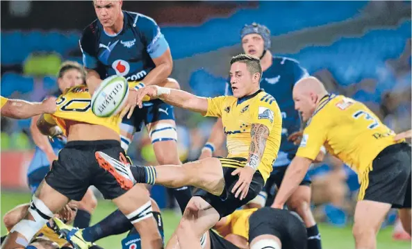  ?? Photo: Photosport ?? Happy feet: Halfback TJ Perenara steered the Hurricanes to two wins in South Africa.