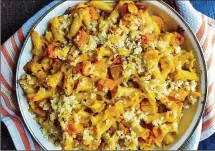  ?? CONTRIBUTE­D ?? Just in time for fall, this savory dish marries the flavors of pumpkin curry with a creamy mac and cheese.