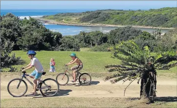  ??  ?? CYCLING FUN: Children enjoy a ride at one of the holiday destinatio­ns along the Eastern Cape coastline