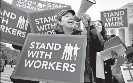  ?? Alex Wong Getty Images ?? THE HIGH court’s 5-4 decision in Janus vs. AFSCME has outraged Democrats and progressiv­es. Above, a Washington rally in February.