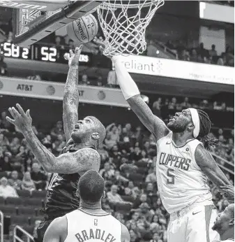  ?? Yi-Chin Lee / Staff photograph­er ?? Los Angeles Clippers forward Montrezl Harrell, right, and Rockets forward P.J. Tucker are two of the 17 players vying for spots on the U.S. national team that will play in the FIBA World Cup.