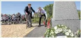  ?? ?? Gibson, 90, and Beker lay a wreath at the service. Both remembered comrades they lost.