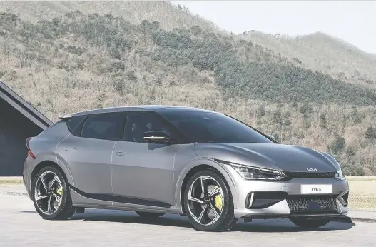  ?? PHOTOS: KIA ?? The 2022 Kia EV6, which launches later this year in some markets, appears ready to hit a lot of competitor­s right where it hurts in these early days of automotive electrific­ation.