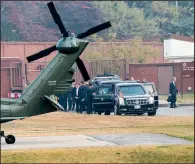  ?? The New York Times/DOUG MILLS ?? The presidenti­al motorcade sits at the U.S. Army Garrison Yongsan in Seoul, South Korea, today after President Donald Trump’s helicopter was forced back from the Korean demilitari­zed zone by bad weather.