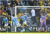  ?? RUI VIEIRA AP ?? Manchester City’s Jack Grealish (center) celebrates after scoring the opening goal on Saturday.