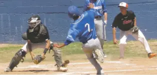  ?? WILL WEBBER/THE NEW MEXICAN ?? St. Michael’s baserunner James Hena slides into home just ahead of the throw to Taos catcher Enrique Archuleta in the third inning of Saturday’s Class 4A State Baseball Tournament game at the Christian Brothers Athletic Complex.