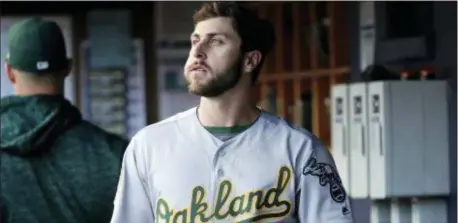  ?? FRANK FRANKLIN II — THE ASSOCIATED PRESS ?? Oakland’s Dustin Fowler (11) looks at the field before the team’s game against the Yankees on Friday in New York.