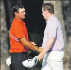  ?? Photograph: Warren Little/Getty Images ?? 2018 Masters champion Patrick Reed congratula­tes Bob on his superb round of 63 after the second day of the Turkish Airlines Open.