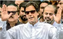  ?? AFP ?? Imran Khan speaks to the media after casting his vote at a polling station in Islamabad on Wednesday. —