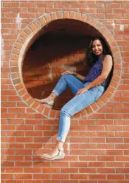  ?? AP PHOTO/CHRIS CARLSON ?? Megan Foster poses for a picture on the campus of the University of North Carolina-Charlotte in Charlotte, N.C.