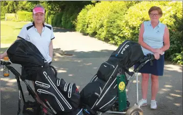  ??  ?? Claire Murphy and Katie Sheehan enjoying a round of golf in Courtown.