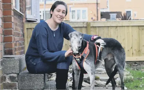  ??  ?? Diane Cullen with her rescue greyhound Dylan. Pictures: Frank Reid