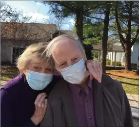  ?? COURTESY OF WHITE HORSE VILLAGE ?? Welthie and Walter Fitzgerald wear purple to show their support for Alzheimer’s awareness.