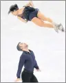  ?? AP PHOTO/JULIE JACOBSON ?? Meagan Duhamel and Eric Radford of Canada perform in the pair figure skating short program in the Gangneung Ice Arena at the 2018 Winter Olympics in Gangneung, South Korea, Wednesday.
