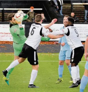  ??  ?? Jarrad Wright and Kayne McLaggon foiled by the keeper against Slough Town