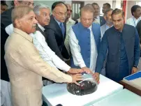  ?? APP ?? Prime Minister Nawaz Sharif is pushing a button to inaugurate the first phase of 1230MW Haveli Bahadur Shah Power Plant. —