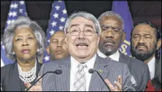  ?? AP ?? Members of the Congressio­nal Black Caucus — outgoing Chairman Rep. G. K. Butterfiel­d, D-N.C. (center), and (from left) Rep. Joyce Beatty , D-Ohio, Rep. Hakeem Jeffries, D-N.Y., Butterfiel­d, Rep. Gregory W. Meeks, D-N.Y., and Rep. Al Green, D-Texas, are...