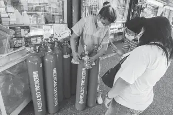  ?? ABS-CBN News photo) (Mark Demayo/ ?? A new stock of medical oxygen tanks go on sale in a supply store in Manila on April 11, 2021, amid the high demand due to rising COVID-19 cases and over-capacity of hospitals.