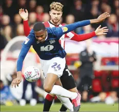  ??  ?? CLASH: Blackburn’s Tosin Adarabioyo and Emiliano Marcondes