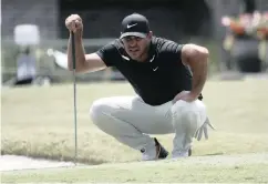  ??  ?? BROOKS Koepka looks at his putt on the ninth green, during the second round of the RBC Heritage golf tournament on Friday at Hilton Head Island in South Carolina. Koepka will be tested for Covid-19 after standing next to Nick Watney, who tested positive.