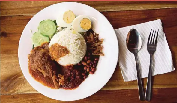  ?? FILE PIC ?? Some local favourites are easy to embrace, like ‘nasi lemak’.