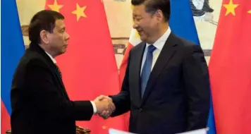  ??  ?? President Rodrigo Duterte meets with China President Xi Jinping in Beijing in this file photo. (File Photo)