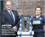  ??  ?? AMBITIONS Philip Doyle and Scotland’s Rachel Malcolm pose with the Women’s Six Nations trophy