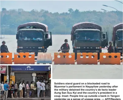  ??  ?? Soldiers stand guard on a blockaded road to Myanmar’s parliament in Naypyitaw yesterday after the military detained the country’s de facto leader Aung San Suu Kyi and the country’s president in a coup. Inset: People line up outside a bank in Yangon yesterday as a sense of unease grew. — AFP/Reuters