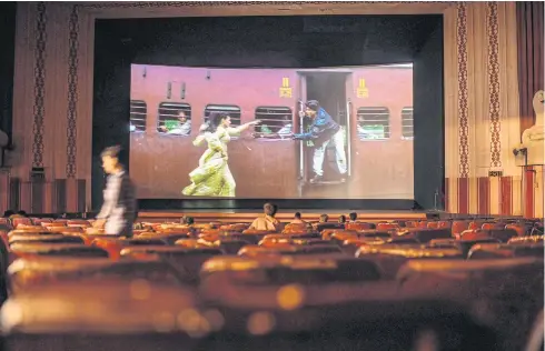 ?? ?? Dilwale Dulhania Le Jayenge plays inside the Maratha Mandir cinema last year.