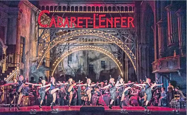  ??  ?? Lavish spectacle: David Mcvicar’s production of Faust at Covent Garden. Below, Michael Fabiano, as Faust, with Irina Lungu, whose illness forced an opening-night substituti­on