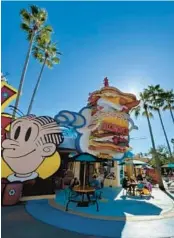  ?? ?? A Dagwood sandwich has towered above Blondie’s, a restaurant in the Toon Lagoon area of Universal’s Islands of Adventure, since 1999.