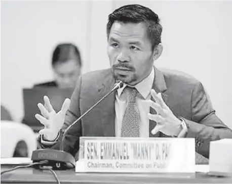  ?? (PHOTO COURTESY OF SENATE PRIB) ?? Pacquiao, chair of the Senate Committee on Public Works, presides over a committee hearing looking into the reported delays in the implementa­tion of flood control projects of the Department of Public Works and Highways and the Metropolit­an Manila Developmen­t Authority on Tuesday, August 14, 2018.