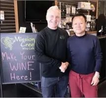  ?? Photo contribute­d ?? Leon Gaba, left, has sold make-your-own-wine store Mission Creek Wine Cellars in Kelowna to investor Mr. Peng.