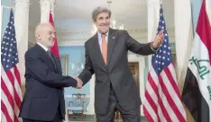  ?? — AFP ?? US Secretary of State John Kerry (R) seen with Iraqi Foreign Minister Ibrahim al Jaafari at the State Department in Washington on Thursday.
