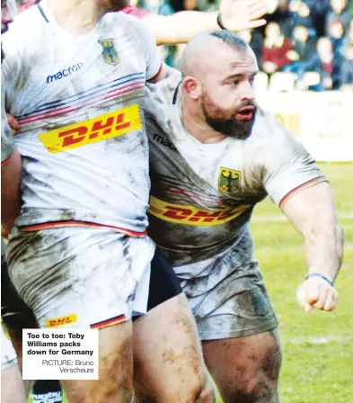  ?? PICTURE: Bruno Verscheure ?? Toe to toe: Toby Williams packs down for Germany