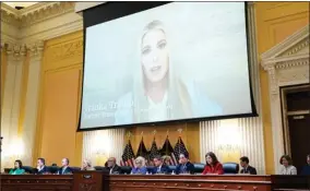  ?? ?? A video showing former White House Advisor Ivanka Trump speaking during an interview with the Jan. 6th Committee is shown as committee members from left to right, Rep. Stephanie Murphy, D-fla., Rep. Pete Aguilar, D-calif., Rep. Adam Schiff, D-calif., Rep. Zoe Lofgren, D-calif., Chairman Bennie Thompson, D-miss., Vice Chair Liz Cheney, R-wyo., Rep. Adam Kinzinger, R-ill., Rep. Jamie Raskin, D-MD., and Rep. Elaine Luria, D-VA., look on, as the House select committee investigat­ing the Jan. 6 attack on the U.S. Capitol holds its first public hearing to reveal the findings of a year-long investigat­ion, at the Capitol in Washington, Thursday, June 9, 2022. (Photo by J. Scott Applewhite, AP)