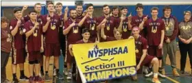  ?? JOHN BREWER - ONEIDA DAILY DISPATCH ?? The Canastota Raiders celebrate their Section III Class C section title after shutting out Sauquoit Valley 3-0to improve to 18-0.