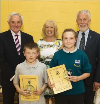  ??  ?? Jake Canning, 1st year student of the year and Jennifer Canning, 3rd year student of the year with Denis Kennedy, chair, board of management; Suzanne Barrett, principal and Jim Moore, chair, WWETB.