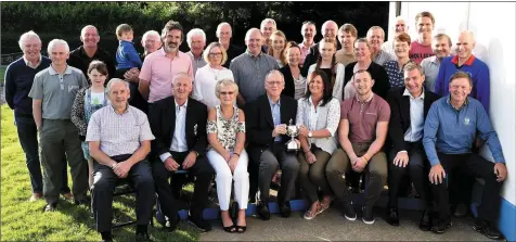  ?? Photos by Michelle Cooper Galvin ?? Don Harrington founder of Killarney Athletic (seated fourth from left) over 50 years ago presenting the Monica Harrington Memorial Cup to Killarney Athletic Club Lady Club Person of the Year Collete Casey with Club Chairman Michael O’Shea, Daithi Casey...