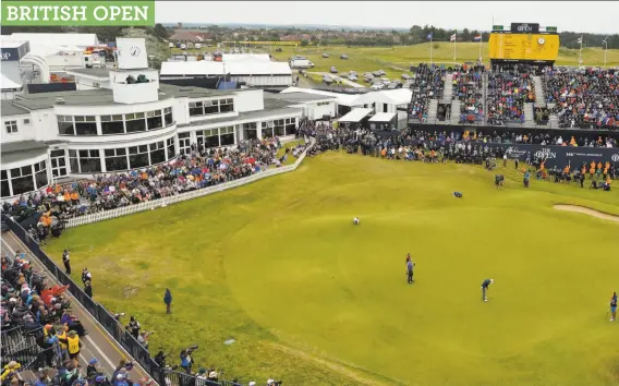  ?? Dan Mullan / Getty Images ?? The fans at Royal Birkdale have a seat at history as Jordan Spieth (white cap) sinks the putt on the 18th green that finished off his British Open victory.