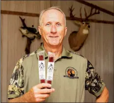  ?? Arkansas Democrat-Gazette/CARY JENKINS ?? Ronnie Ritter, director of Arkansas Hunters Feeding the Hungry, holds venison snack sticks. Last year, the organizati­on worked with hunters to provide 88,000 pounds of deer meat to food pantries, but Ritter says there is an opportunit­y to do a lot more.