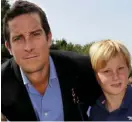  ??  ?? Risk: Bear Grylls with son Jesse, 12, who was marooned on rocks in a training exercise (top)