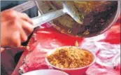  ?? AFP ?? Instant noodles being served at a roadside food stall in New Delhi