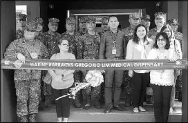  ??  ?? Marine officials and SM execs at the opening of the upgraded dispensary.