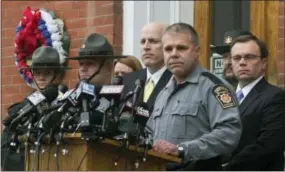  ?? THE ASSOCIATED PRESS ?? Pennsylvan­ia State Police Lt. Col. George Bivens speaks during a news conference in front of the Pike County Courthouse on Friday on Friday in Milford after a hearing for accused killer Matthew Frein.