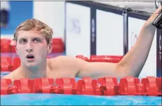  ?? Martin Meissner / Associated Press ?? Kieran Smith of Ridgefield rests after his swim Monday in a semifinal during the men's 200-meter freestyle at the 2020 Summer Olympics.