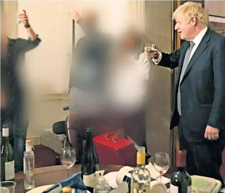  ?? ?? The photograph­s obtained by ITV News, below, throw fresh doubt on claims that Boris Johnson did not participat­e fully in Lee Cain’s leaving drinks at No 10 in November 2020