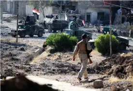  ?? Foto: StR ?? Har övertaGet. Irakiska trupper tågade in i centrum av Tal Afer i lördags.