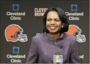  ?? AMY SANCETTA - THE ASSOCIATED PRESS ?? In this Oct. 21, 2010, file photo former Secretary of State Condoleezz­a Rice talks with the media after visiting with the Cleveland Browns coaches and players at the Browns training facility in Berea, Ohio. Browns general manager John Dorsey says the team has not discussed Rice as a candidate for its coaching vacancy. Rice is an avid Browns fan and has visited the team’s headquarte­rs on numerous occasions in recent years.